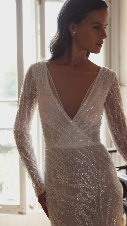 Muse Trumpet/Mermaid Deep V-neck Milk Wedding dress